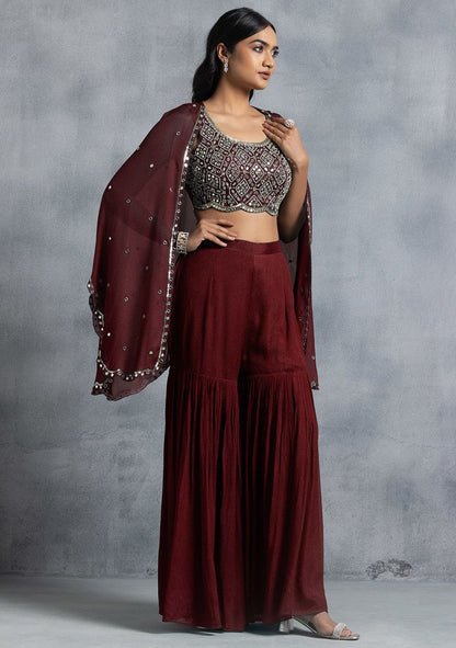 Maroon Sharara Set With Bead Mirror Hand Embroidered Blouse And Embellished Jacket