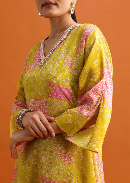 Yellow Printed Asymmetrical Kurta And Pant