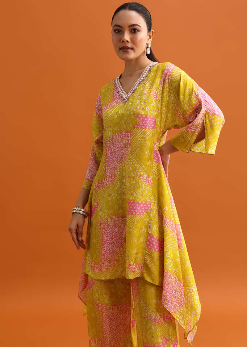 Yellow Printed Asymmetrical Kurta And Pant